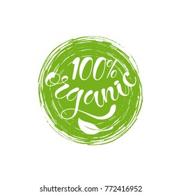 100% organic text lettering with leaf on circle painted spot label. Vector illustration. 