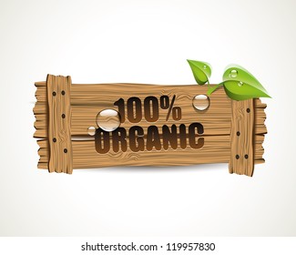 100% Organic - wooden bio icon with leaves and waterdrops