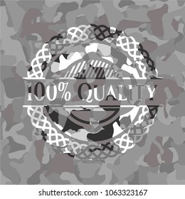 100% Quality written on a grey camouflage texture