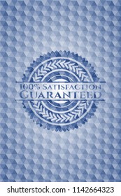  100% Satisfaction Guaranteed blue emblem with geometric pattern background.