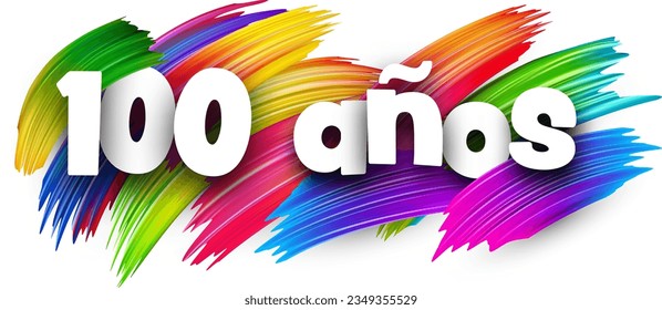 100 years at spanish paper word sign with colorful spectrum paint brush strokes over white. Vector illustration.