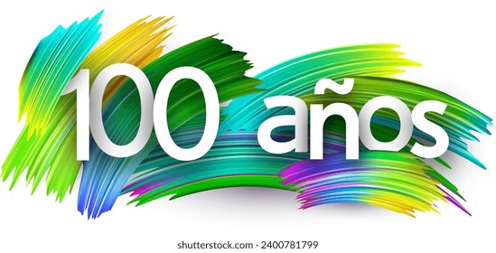 100 years at spanish paper word sign with colorful spectrum paint brush strokes over white. Vector illustration.