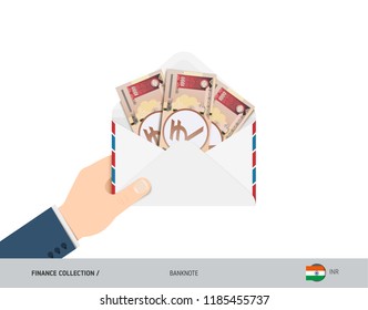 1000 Indian Rupee Banknotes in envelope hold in hand. Flat style opened white envelope with cash. Salary payout or corruption concept.
