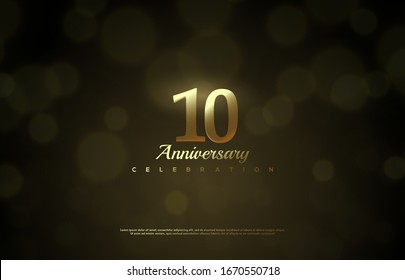 10th anniversary background with illustrations of gold colored figures and golden light effects.