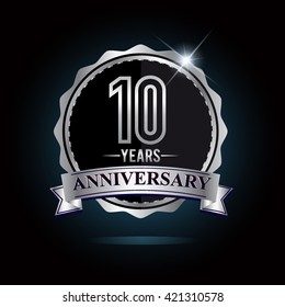 10th anniversary logo with ribbon and silver shiny badge, vector design for birthday celebration