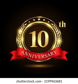 10th golden anniversary logo, with shiny ring and red ribbon, Laurel wrath isolated on black background, vector design