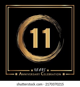 11 years anniversary celebration with grunge circle brush and gold frame isolated on black background. Creative design for happy birthday, wedding, ceremony, event party, and greeting card.