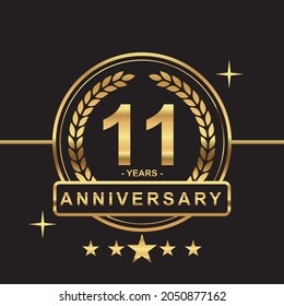 11 years anniversary golden color with circle ring and stars isolated on black background for anniversary celebration event luxury gold premium vector