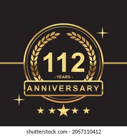 112 years anniversary golden color with circle ring and stars isolated on black background for anniversary celebration event luxury gold premium vector