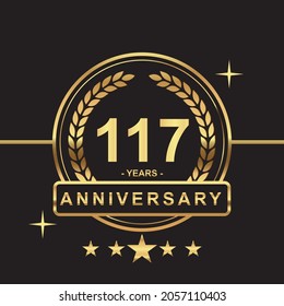 117 years anniversary golden color with circle ring and stars isolated on black background for anniversary celebration event luxury gold premium vector