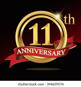 11th golden anniversary logo. with ring and ribbon.