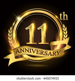 11th golden anniversary logo with ring and ribbon, laurel wreath vector design.