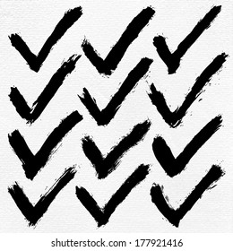 12 black ink sketch check mark on watercolor paper. Isolated shape on white background. Aquarelle abstract textured in handmade technique. Vector illustration clip-art design element in 8 eps