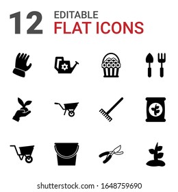 12 garden filled icons set isolated on white background. Icons set with Garden gloves, Watering can, flower basket, Gardening, Wheelbarrow, Gardening tools, wheelbarrow icons.