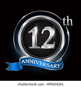 12th anniversary logo with silver ring and blue ribbon.