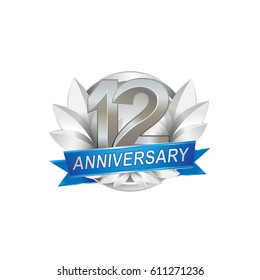 12th Anniversary logo with silver wreath, silver number, blue ribbon