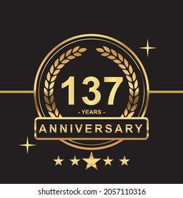 137 years anniversary golden color with circle ring and stars isolated on black background for anniversary celebration event luxury gold premium vector