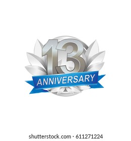 13th Anniversary logo with silver wreath, silver number, blue ribbon