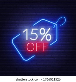 15 percent off neon sign on a dark background.