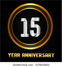 15 years anniversary golden and silver color with circle ring isolated on black background for anniversary celebration event