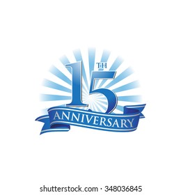 15th anniversary ribbon logo with blue rays of light