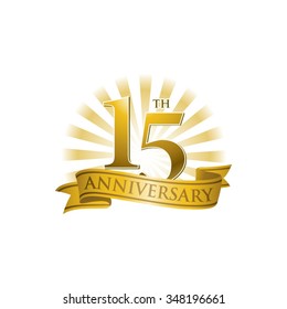 15th anniversary ribbon logo with golden rays of light