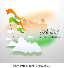 15th August Font With Wavy Indian Flags, Paper Clouds And Red Fort On Glossy Blurred Tricolor Background.