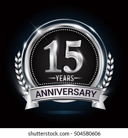 15th silver anniversary logo with laurel wreath, ribbon and silver ring. vector design