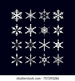 16 light snowflakes on a dark background