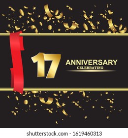17 anniversary logo with confetti golden colored and red ribbon isolated on black background, vector design for greeting card and invitation card