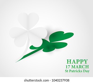 17 MARCH St Patricks Day .  background.  Card design with paper art green shamrock ,white background .Vector