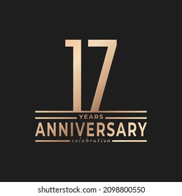 17 Year Anniversary Celebration with Thin Number Shape Golden Color for Celebration Event, Wedding, Greeting card, and Invitation Isolated on Dark Background