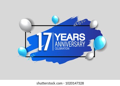 17 years anniversary celebration design with blue brush and balloons isolated on white background