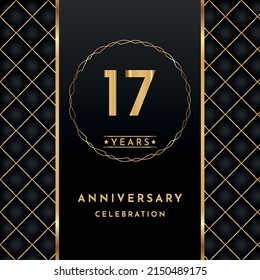 17 years anniversary celebration golden color with circle ring isolated on black background for the anniversary celebration event, wedding, greeting card, birthday party, and Invitation.