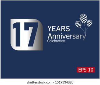 17 years anniversary celebration logotype with silver color isolated on blue background