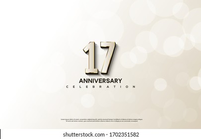 17th anniversary background with an illustration of white numbers with gold on the edges.