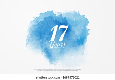 17th anniversary background with illustrations of white numbers and the writing below on a water color background.