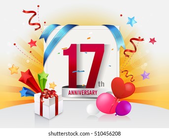 17th anniversary celebration with colorful confetti and balloon with shiny yellow background