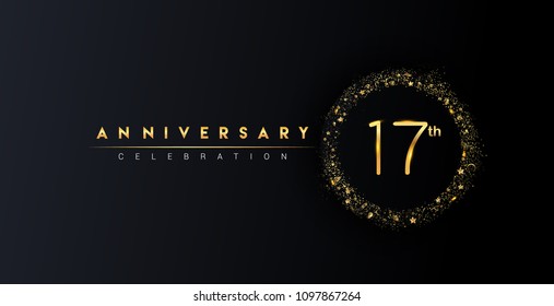 17th anniversary logo with confetti and golden glitter ring isolated on black background, vector design for greeting card and invitation card.