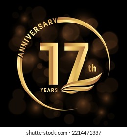 17th Anniversary Logo, Logo design with gold color wings for poster, banner, brochure, magazine, web, booklet, invitation or greeting card. Vector illustration