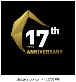 17th anniversary logo with modern gold shape. Anniversary signs illustration. Gold anniversary logo design and illustration