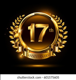 17th golden anniversary celebration logo with ring and ribbon, laurel wreath design