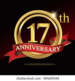 17th golden anniversary logo. with ring and ribbon.