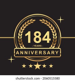 184 years anniversary golden color with circle ring and stars isolated on black background for anniversary celebration event luxury gold premium vector