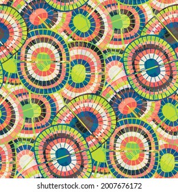 1970s style rainbow seamless vector pattern background. Backdrop with mosaic style oval pairs of rainbows blue, green red colors. Funky overlapping texture repeat in boho hippie style. Hipster print