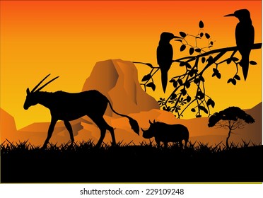 2 birds on tree branch and antilope silhouette