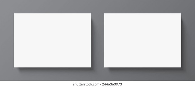 2 blank white paper posters hanging on a grey wall background. Poster gallery vector mockup for horizontal art, image, or text placement.