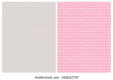 2 Simple Abstract Cross Sign Vector Patterns. White Irregular Brush Crosses on a Pink and Light Gray Backgrounds. Funny Hand Drawn Geometric Repeatable Design. Irregular Infantile Style Check Marks.