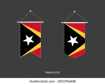 2 style of Timor Leste flag. Ribbon versions and Arrow versions. Both isolated on a black background.