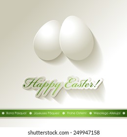 2 white eggs Easter greetings white green multilingual